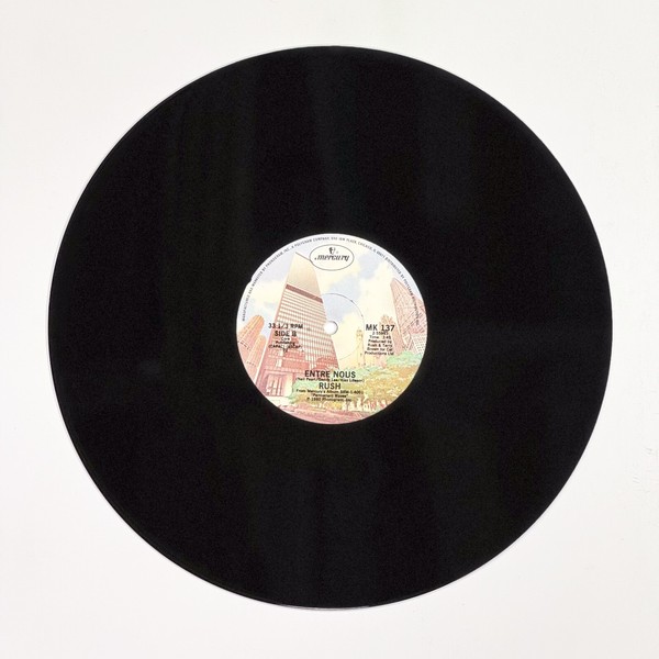 Back of the record Entre Nous by Rush