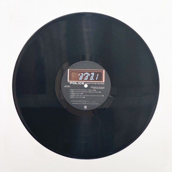 Front of the record Ghost In The Machine by The Police