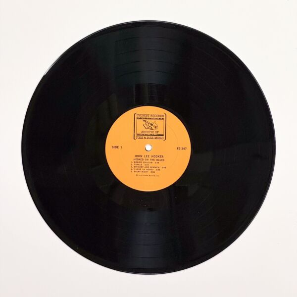 Front of the record Hooked On The Blues by John Lee Hooker