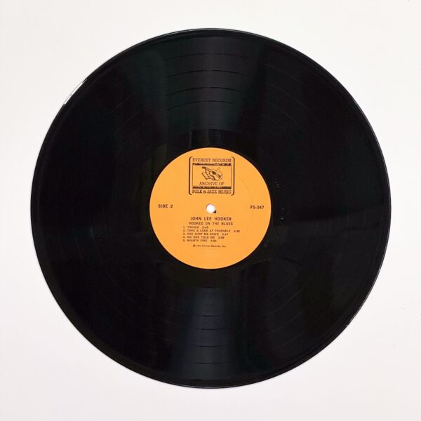 Back of the record Hooked On The Blues by John Lee Hooker