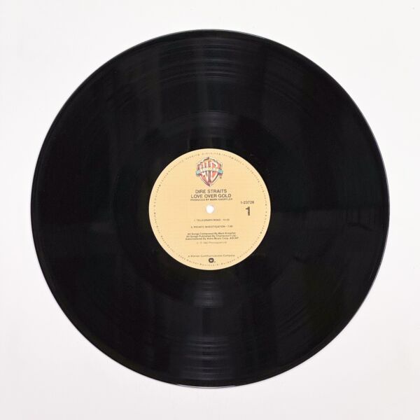 Front of the record Love Over Gold by Dire Straits