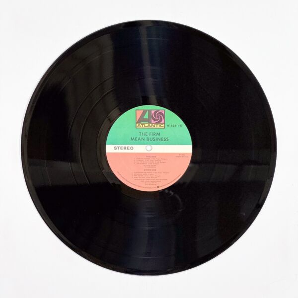 Front of the record Mean Business by The Firm