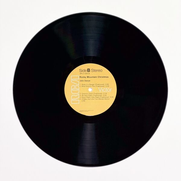 Back of the record Rocky Mountain Christmas by John Denver