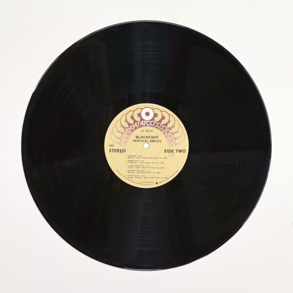 Back of the record Vertical Smiles by Blackfoot