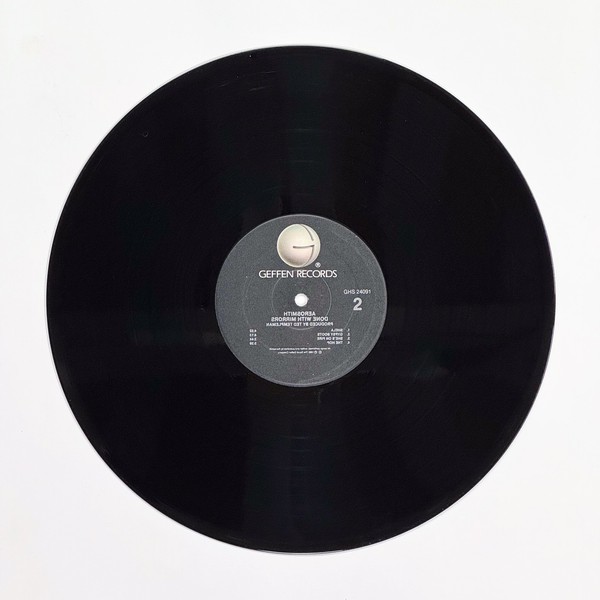 Back of the record Done With Mirrors by Aerosmith