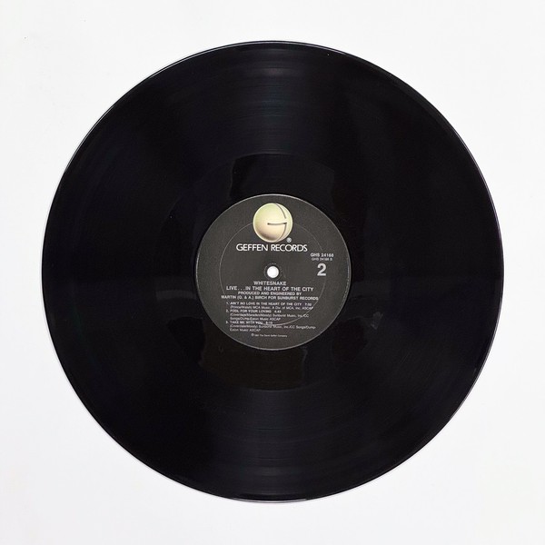 Back of the record Live... In The Heart Of The City by Whitesnake