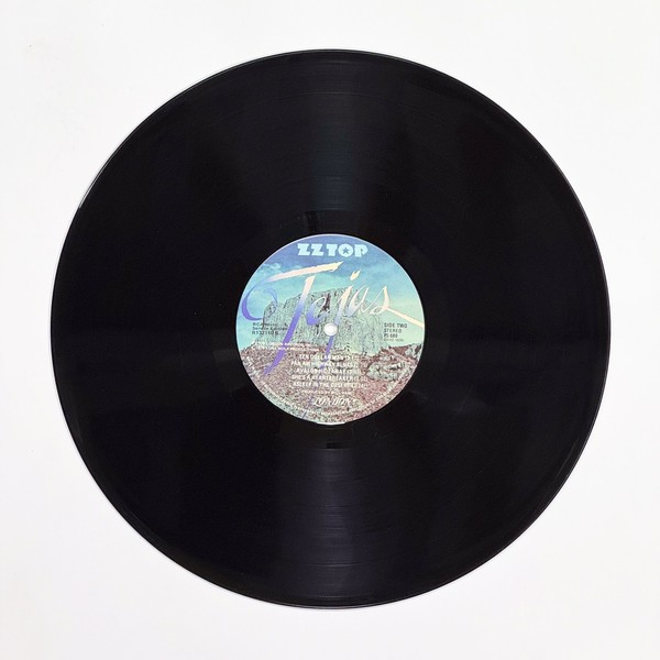 Back of the record Tejas by ZZ Top